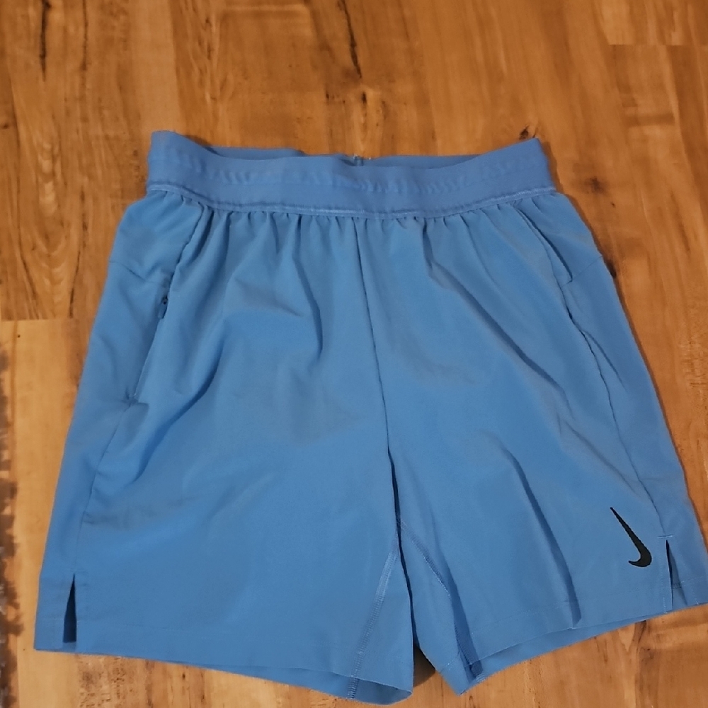 Nike Light Blue Women's Athletic Shorts with Black Swoosh
